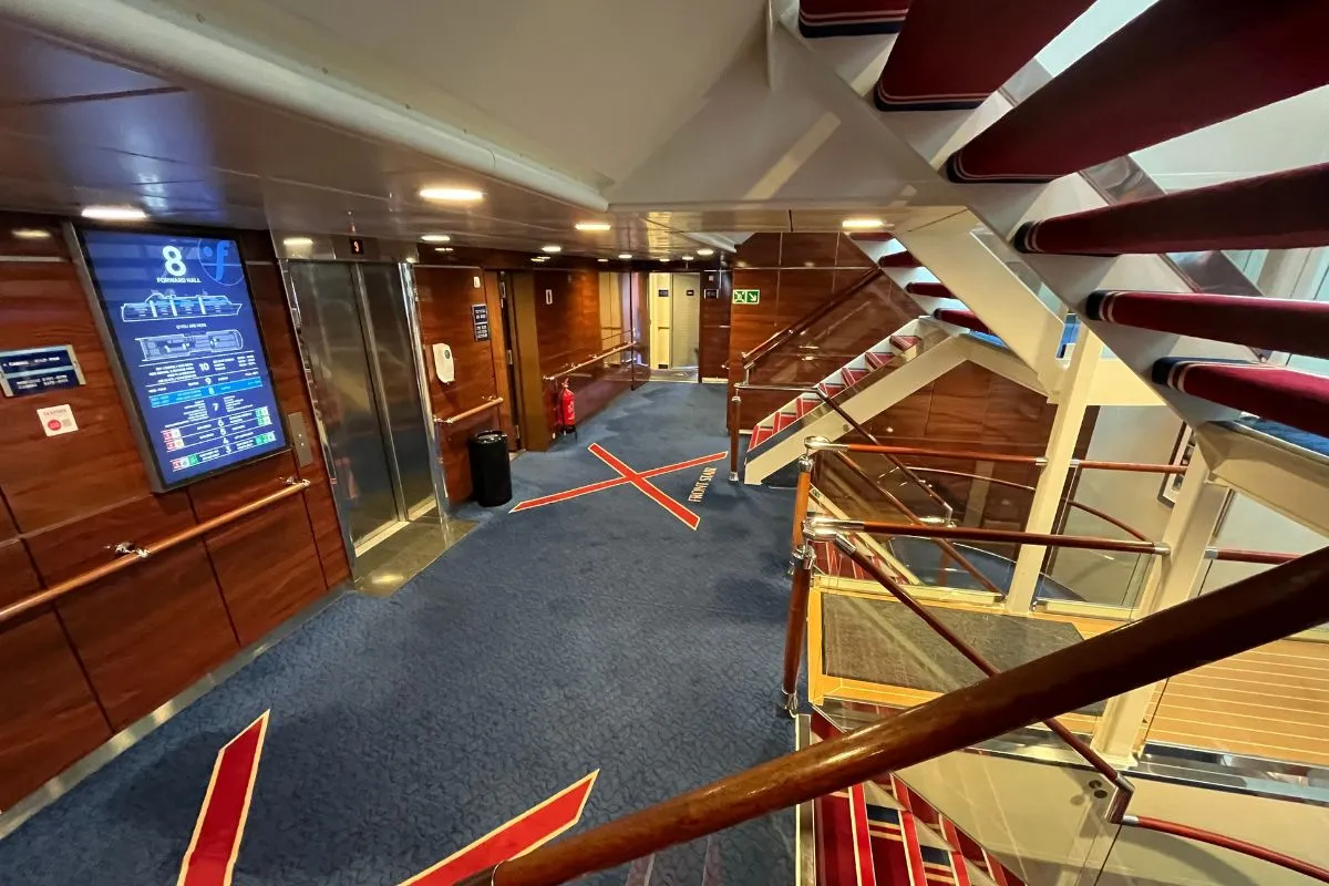 A lounge on board a Fjord Line ferry, with seating and windows onto the sea